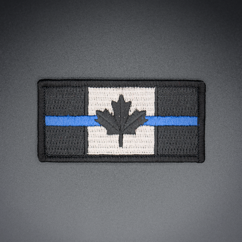 Écusson du drapeau du Canada avec ligne bleue